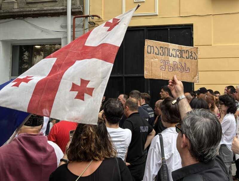 The Georgian government has frozen the bank accounts of a news outlet that has been critical of them, as the trial of its founder is underway